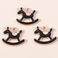 Three golden unicorn rocking horse pendants with black enamel for DIY jewelry making - Black