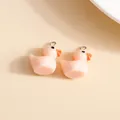 Detailed view of pink resin duck charms with silver metal rings for DIY jewelry making - 10 Pieces/Pack / Orange Pink