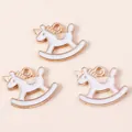 Three gold-plated enamel rocking horse unicorn charms for DIY jewelry making - White