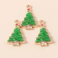 Close-up of green enamel Christmas tree charms with gold plating and hanging loops - Green