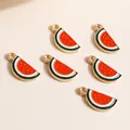 Detailed close-up of colorful watermelon slice enamel pendants for DIY jewelry making - Red