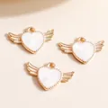 Golden alloy heart wings charm with white enamel detail for DIY jewelry making - White