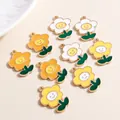 Macro detail of colorful smiley flower charms with golden edges for jewelry making - Multicolor