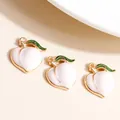 Three peach enamel fruit pendants with gold edges for DIY jewelry making - Pink