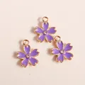 Three purple cherry blossom flower pendants with gold plating and center rhinestone - Purple