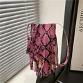 Pink snakeskin pattern shoulder bag with long fringe tassels and adjustable strap - Pink