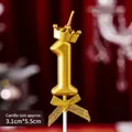 Golden number 1 birthday candle with crown decoration and golden bow on red background - Crown Bow Golden Number Candle 1