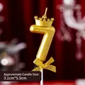 Golden number 7 birthday candle with mini crown and ribbon bow on red velvet background - Crown Bow Golden Number Candle 7