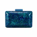 Detail of blue acrylic evening clutch bag showing marble texture and striped lock - Blue
