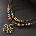 Collier Arbre de Vie vintage avec cordons en cuir tressé marron et perles colorées - Style Pendentif Fleur à Six Pétales en Bronze