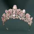 Detail of pink crystal teardrop stones and small diamonds on a gold bridal crown - KC Gold Tone White And Pink Jelly Rhinestone