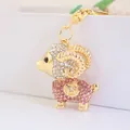 Simpatico portachiavi a capra con strass rosa e bianchi in finitura metallo dorato - Rosa