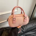 Mini pink bowling bag in pebble leather with top handles and silver hardware - No Pendant / Pink