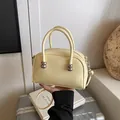 Pale yellow patent leather handbag with silver metallic beads and adjustable strap - No Pendant / Yellow