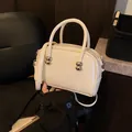 Chic beige patent leather small square handbag with silver metal ball accents and strap - No Pendant / White