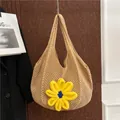 Beige hollow woven tote bag with a large yellow crochet flower for summer beach vacations - Khaki