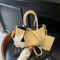 Cream woven texture tote bag with crossbody strap and matching mini pouch accessory - Yellow