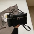 Fashionable black quilted crossbody briefcase bag with adjustable strap and silver hardware - Black