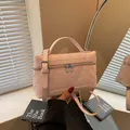 Pink quilted square handbag with double zippers and adjustable crossbody strap - Pink
