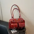 Glossy deep red patent leather bowling bag with vintage front pockets and silver zippers - Red