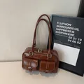 Retro brown high-gloss leather bowling bag with vintage pockets and silver hardware - Brown