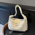 Creamy white quilted tote bag with wide strap on chair, minimalist large capacity shoulder bag - 34*14*26 / Off White