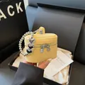 Mini bright yellow lychee leather handbag with heart charm and silver hardware - Yellow