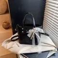 Elegant black bucket bag with a lace pearl bow pendant and adjustable strap - Black with Bowknot Heart Pendant