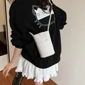 Vertical cream white lychee grain crossbody cell phone bag for women in 2025 style - Off-white without Charm