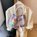 Light purple pleated bucket bag with decorative buckle and cute cartoon pendant - 21*11*15 / Purple With Charm