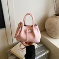 Chic pink pleated bucket bag with metallic handles and adjustable crossbody strap - 21*11*15 / Pink Without Pendant