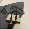 Two-tone beige and black canvas tote bag with crossbody strap and silver studs - Black (Large Without Charm)