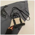 Chic beige woven and black leather contrast mini tote bag with adjustable shoulder strap - Black (Small Without Charm)
