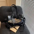 Vintage black tote bag in glossy faux leather with silver studs and zipper detail - Black