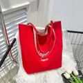 Grand cabas en toile rouge avec broderie Bonjour et bandoulières rayées blanches - Lettres Imprimées Rouge