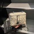 Chic beige quilted chain bag with silver studs and a black camellia charm detail - 18*9*12 / Off White