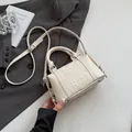 Creamy white embossed letter pillow bag with lychee texture and adjustable strap - 19*9*11 / White