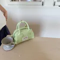 Elegante borsa bowling verde menta in pelle PU con doppi manici ed etichetta logo - Verde