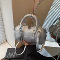 Silver metallic bowling handbag with lychee texture leather and detachable strap - Silver With Pendant