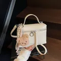 Creamy white box handbag in crinkled leather with bear charm and silk scarf detail - Rice White (with Pendant)