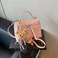 Pink pleated crossbody bag with silver hardware and a cute brown plush bear charm - Pink (With Charm)