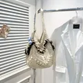 Retro cream crochet tote bag with dark brown ruffle trim and a blue tulip flower charm - Coffee with Pendant