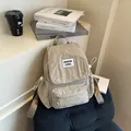 Khaki pleated nylon casual backpack with brand label and drawstring side detail - Khaki