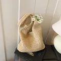 Handgeweven strooien draagtas in natuurlijk beige met een dik geweven touwstructuur - Beige