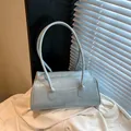 Light blue faux leather shoulder bag in a retro bowling style with long straps - No Pendant / Blue