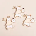 Three enamel rabbit pendants with pocket watches for DIY jewelry and necklaces - White