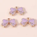Set di 3 dolci ciondoli a fiocco viola con bordi dorati per creazione gioielli DIY - Viola