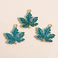 Three teal enamel maple leaf charms with golden veins for DIY jewelry making - Blue