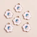 Detailed view of six flower-shaped Tai Chi enamel charms with gold alloy edges for DIY jewelry - White Flower Tai Chi