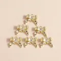 Set of six gold bow pendants with rhinestones and double loops for jewelry making - Rhinestone Bow Style